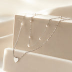Serelle™ Essentials Heart & Pearl Layered Set – Gold-Tone Necklace & Bracelet Duo