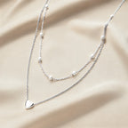 Serelle™ Essentials Heart & Pearl Layered Set – Gold-Tone Necklace & Bracelet Duo